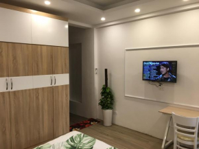 N&D Happy House- Studio Apartment - Phong tieu chuan khach san, bep nau va nha ve sinh trong khuon vien
